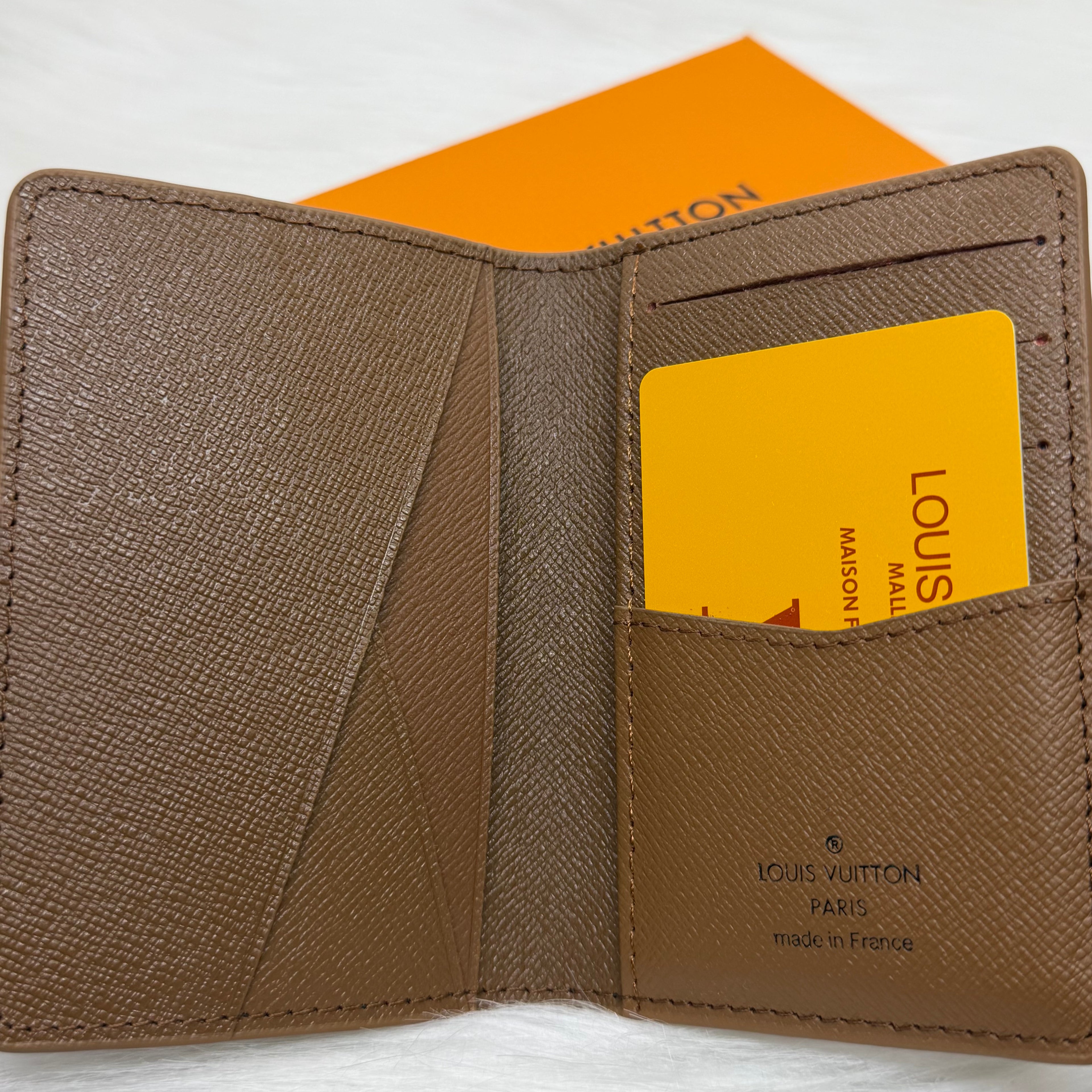 Louis Vuitton Pocket Organizer orange and purple gradient stripe pattern